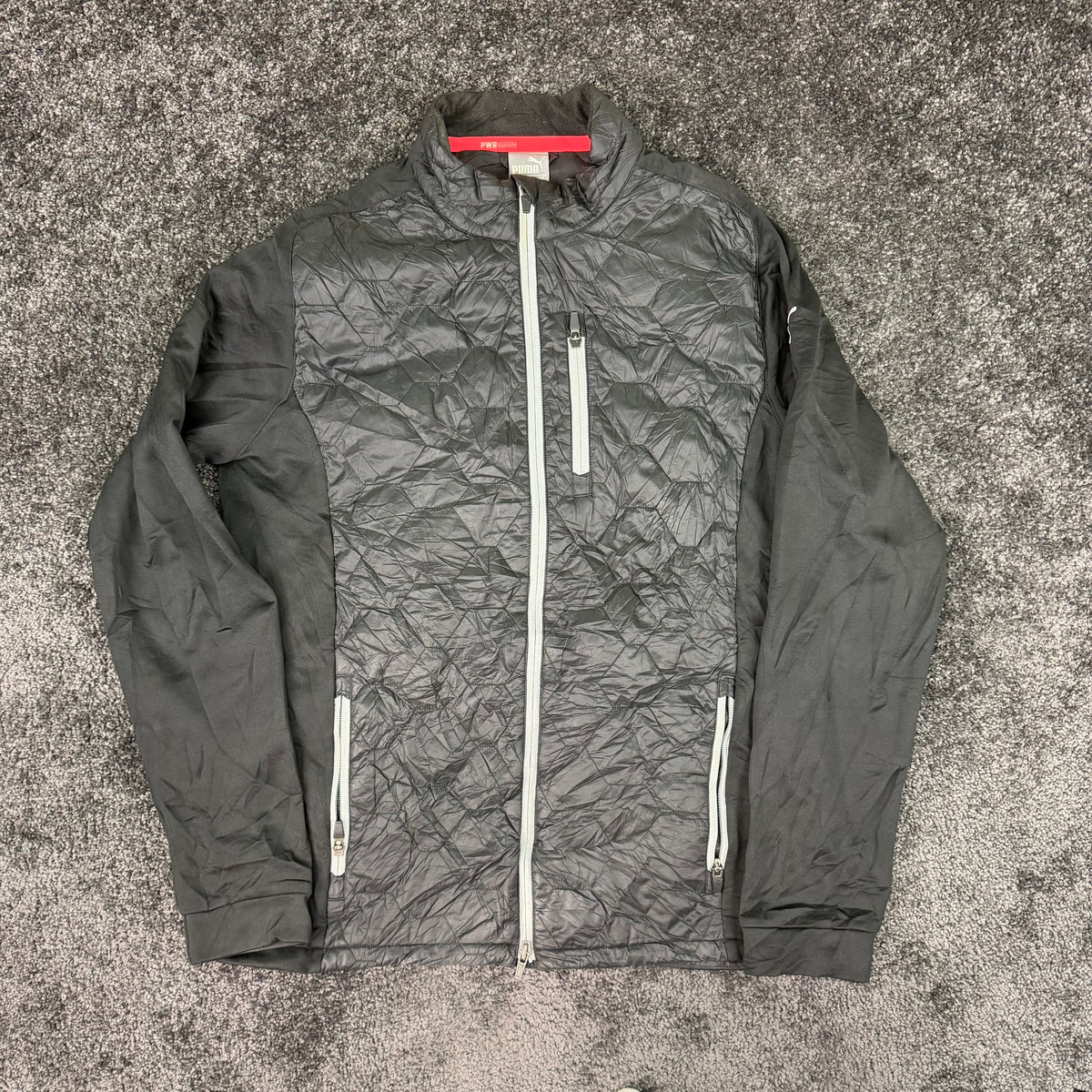 Back of black Puma PWRWARM zip jacket size M