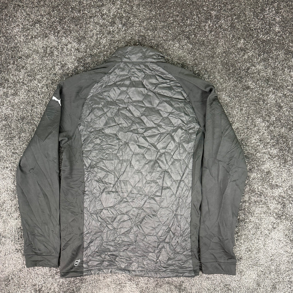 Puma PWRWARM jacket label showing size M and EU 52/54