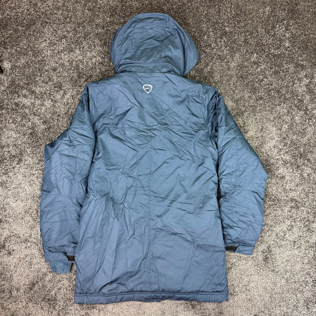 Front of the Nike Storm-FIT England hooded jacket