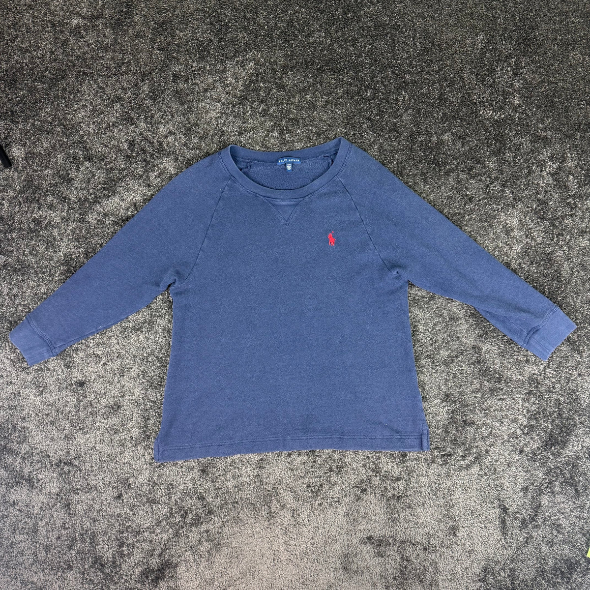 Back of the blue Ralph Lauren crewneck sweatshirt
