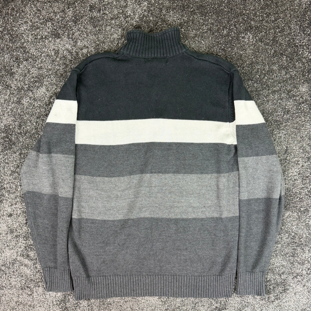 Front of the charcoal striped U.S. Polo Assn. quarter-zip sweater