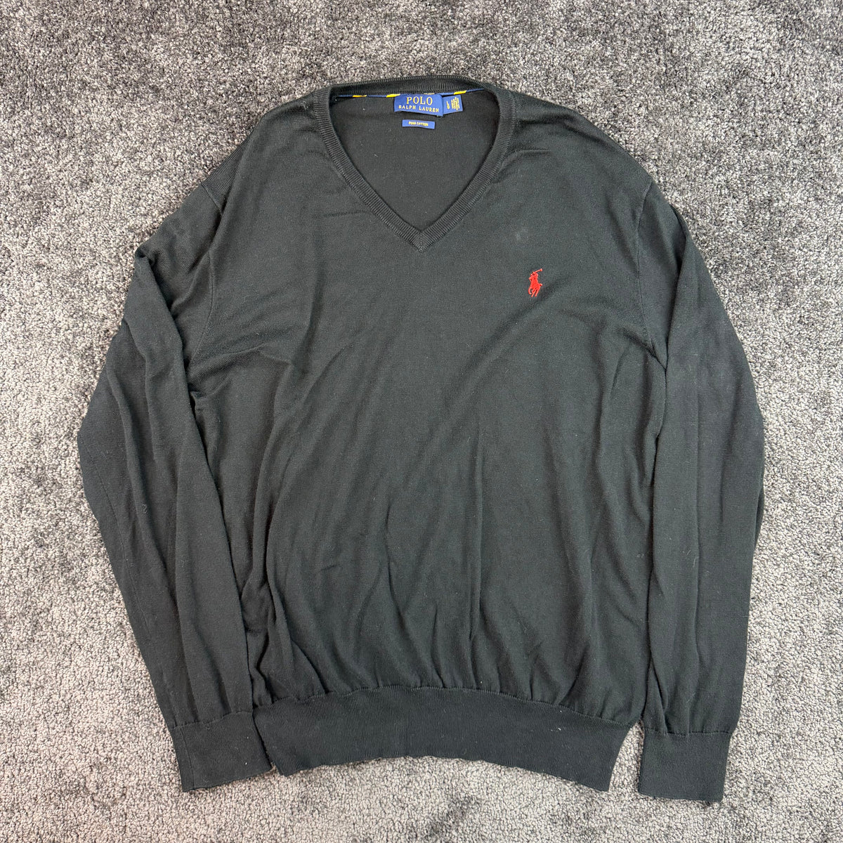 Back of black Polo Ralph Lauren V-neck sweater