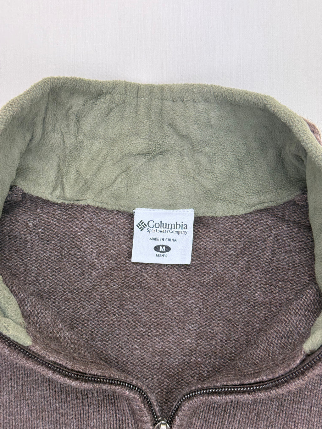 Columbia men's size M label and olive inner collar