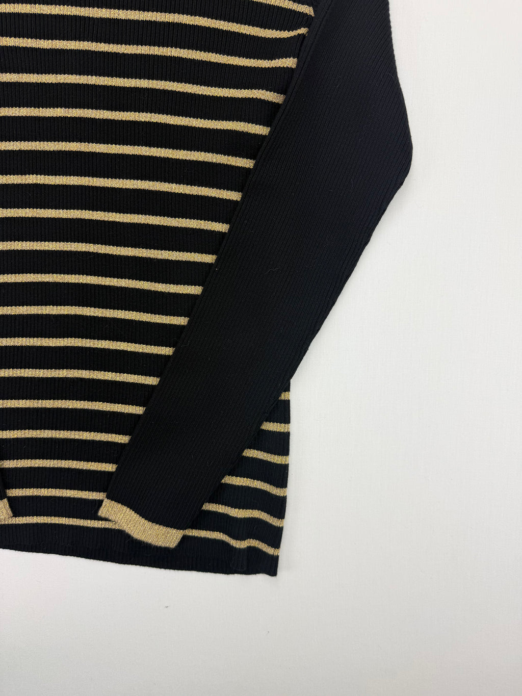 Gold striped knit and cuff detail