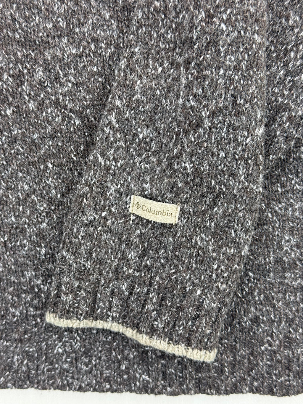 Columbia sleeve tag and cream cuff detail