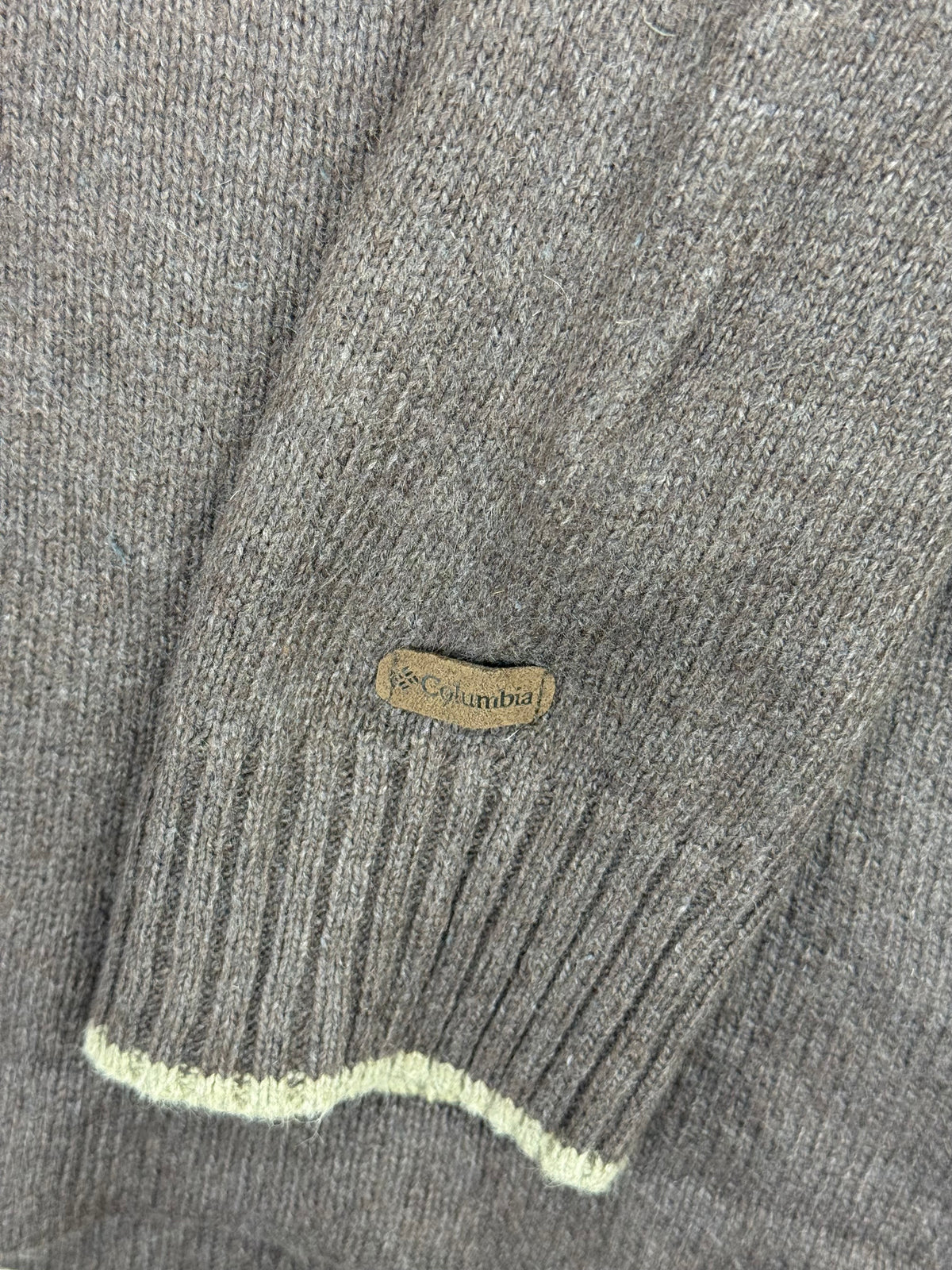 Columbia sleeve tag and cream cuff trim